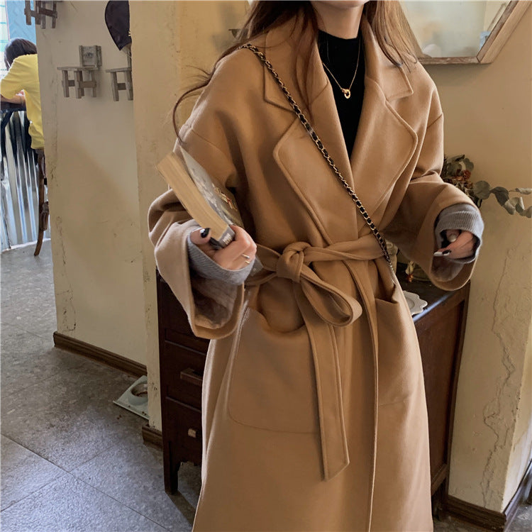 A sash split wool coat