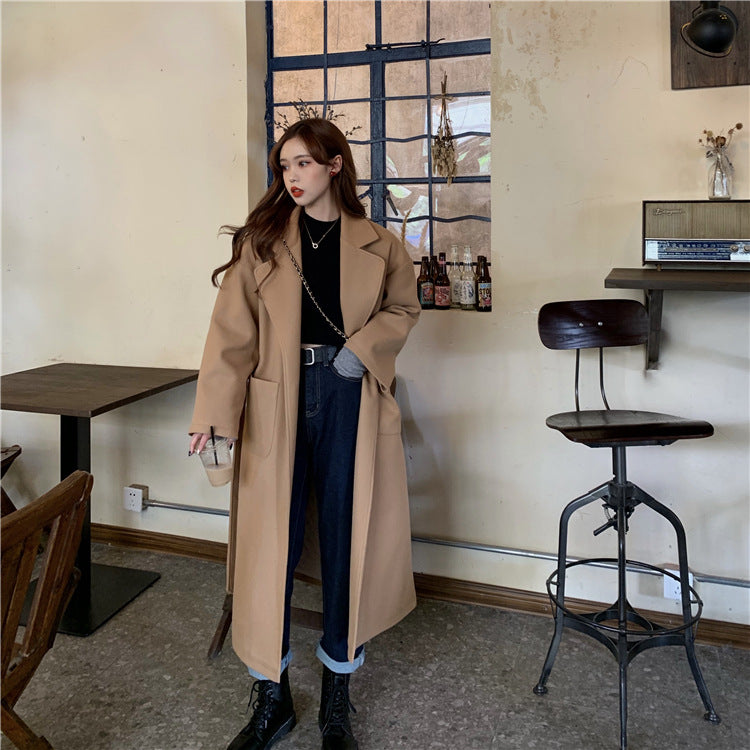 A sash split wool coat